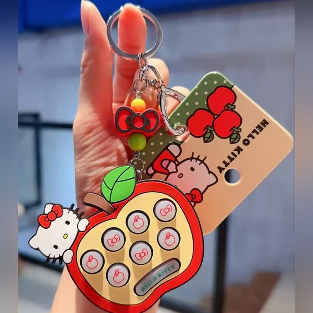EXCLUSIVE - Hello Kitty Nurse Kitty Purse Pal Plushie & Game Bag Charm - Picture 2 of 9